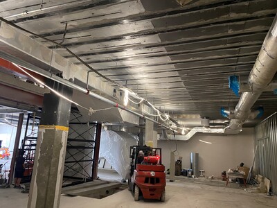 Reinforced concrete deck between ground and first floor between modules 25 and 26 (see sectional drawing).
