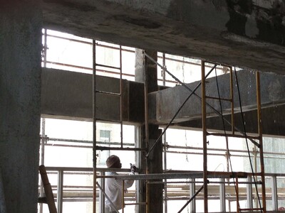Execution of the reinforcement of the columns with S&P sheets