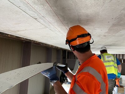 Laminates being applied in the presence of the S&P team