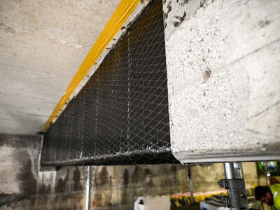 The shear reinforcement with S&P C-Sheet covers the entire beam.