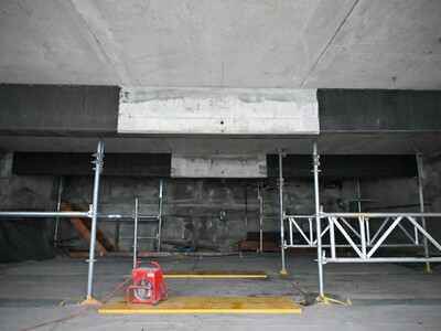 The reinforced concrete beams in the temporarily heated boat shelter.