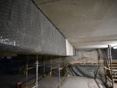 The reinforcement was blinded with quartz sand in preparation for further coatings.