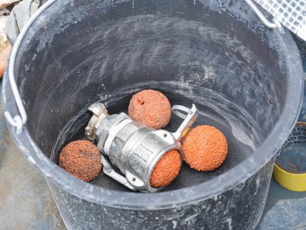 Special balls are used for cleaning the pump hose. Image: S&P